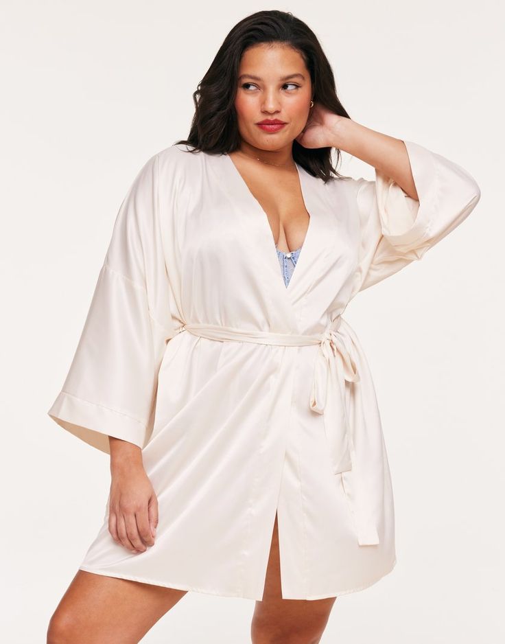 The Izabella Light White kimono robe is made with sustainable, recycled polyester and spandex for a soft, breathable feel. With a self-tie closure and full coverage, this robe is perfect for a comfortable night's sleep. (Available in plus-sizes 1X-4X.) Robe Sleepwear, White Kimono, Lounge Robes, One Piece Clothing, One Piece Pajamas, Adore Me, Sleepwear & Loungewear, Light White, Plus Size Shorts