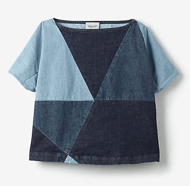 a women's top with blue and black patchwork