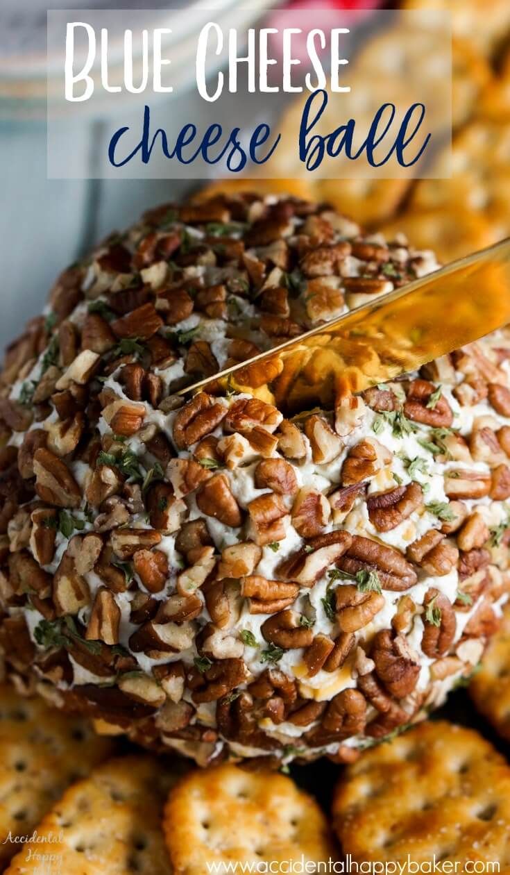 blue cheese cheese ball on a plate with crackers