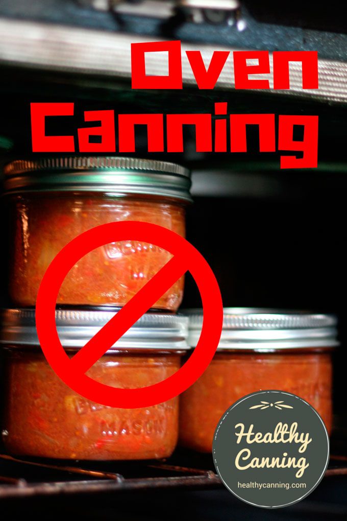 jars filled with food sitting on top of a shelf next to a sign that says oven canning