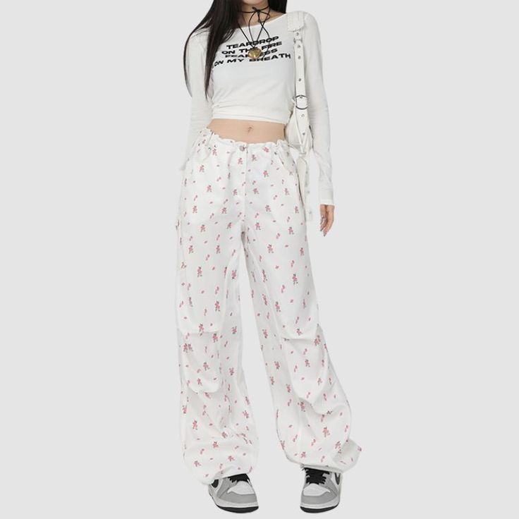 Material: 90-95% PolyesterFeatures: Pants, casual pants, parachute pants, wide legs, zipper front, solid color, flower pattern full printed, drawstring waist, straight-leg, relaxed fit, unisex, couple outfits.Style: Casual, college, streetwear Casual Baggy Floral Print Pants, Spring Baggy Wide-leg Parachute Pants, Spring Baggy Wide-leg Cargo Pants, Casual Spring Parachute Pants With Straight Leg, Casual Straight Leg Pants With Floral Print, Spring Casual Straight Leg Parachute Pants, Spring Casual Straight Cargo Pants, Casual Floral Print Straight Pants, Spring Trendy Wide-leg Parachute Pants