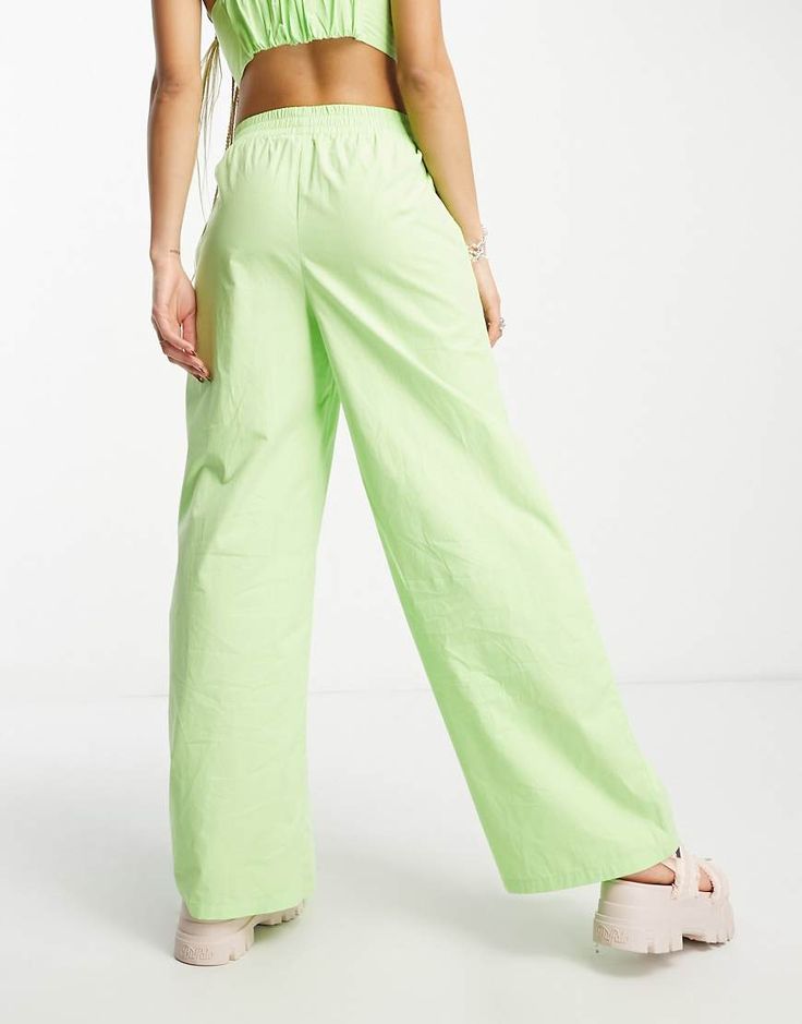 Pants by Signature 8 Part of a co-ord set Top sold separately High rise Elasticized waistband Side pockets Relaxed fit Green Wide Leg Pants With Side Pockets, Trendy Green Wide Leg Pants With Side Pockets, Green Straight Leg Parachute Pants With Elastic Waistband, Green Loungewear Pants With Side Pockets, Green Lounge Pants With Side Pockets, Trendy Green Straight Parachute Pants, Green Wide-leg Parachute Pants With Elastic Waistband, Green Straight Leg Parachute Pants For Spring, Green Wide-leg Parachute Pants For Spring