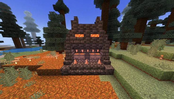 an image of a fire place in the middle of some trees and bushes on a minecraft map