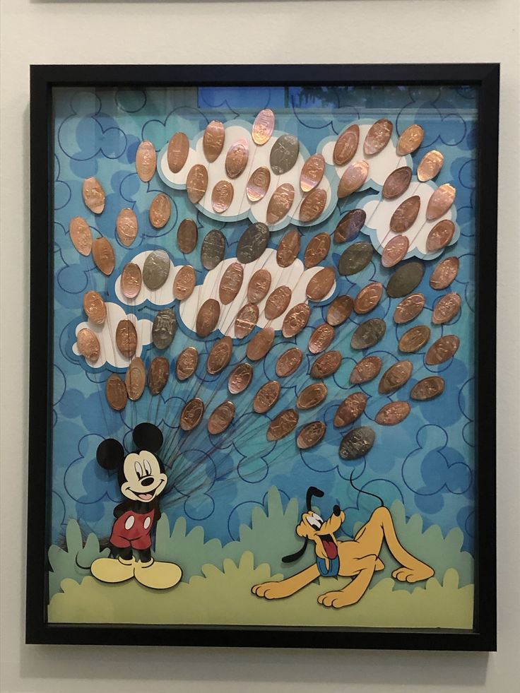 a mickey mouse and minnie mouse with coins in the shape of clouds on a blue background