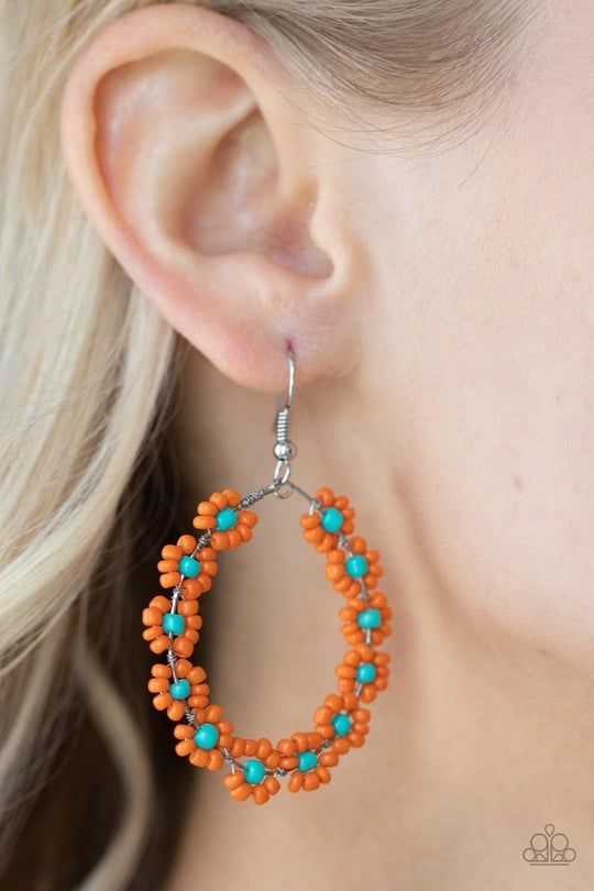 Bordered in dainty pink rhinestones, the center of an oversized silver teardrop is filled with an airy floral pattern for a seasonal flair. Earring attaches to a standard fishhook fitting. Sold as one pair of earrings. Shipping Warehouse, Floral Frames, Orange Earrings, Beaded Earrings Patterns, Kids Earrings, Fish Hook Earrings, Orange And Turquoise, Paparazzi Accessories, Floral Fashion