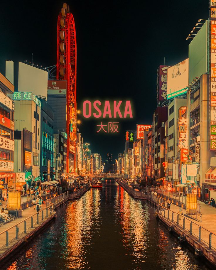 a river running through a city with tall buildings and neon signs on the side of it