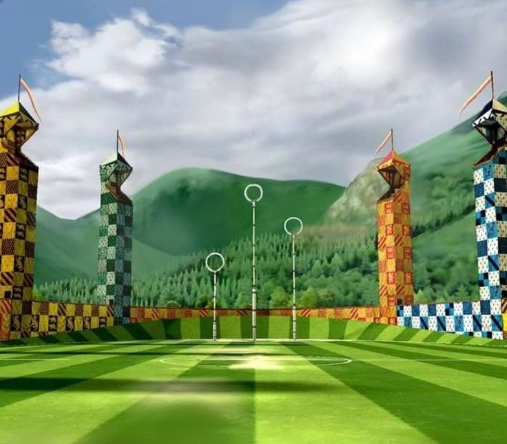 an animated view of a green golf course with checkered flags on it and mountains in the background