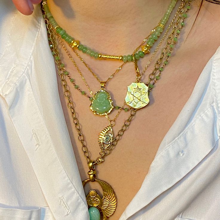 "Back in Stock! Seaglass Green Buddha set in gold vermeil with swivel lobster clasp, measures 9 1/4\" long. Shown with our Chalcedony beaded necklace sold separately. For more of our one of a kind jewelry and neck stack ideas go to our website: www.ficklefoxco.com" Gold Jade Necklace With Gemstone Beads, Gold Jade Necklaces With Round Beads, Adjustable Gold Charm Necklaces With Gemstone Beads, Gold Multi-strand Necklace With Lobster Clasp, Spiritual Gold Crystal Necklaces For Layering, Gold Jade Beaded Necklaces With Round Beads, Gold Jade Round Beaded Necklaces, Gold Jade Beaded Necklaces With Gemstone Beads, Gold Jade Gemstone Beaded Necklaces