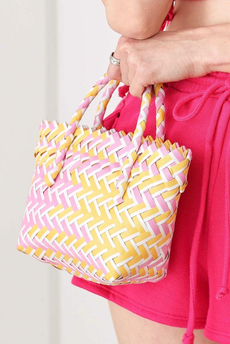 Basket Wave Handbag - Tasha Apparel Wholesale Trendy Yellow Shoulder Bag For Beach Season, Spring Beach Striped Bags, Spring Striped Beach Bags, Striped Bags For Spring Beach Outings, Pink Woven Beach Bag, Summer Striped Woven Straw Bag, Pink Woven Beach Bag For Summer, Yellow Woven Beach Bag For Spring, Trendy Yellow Straw Bag With Braided Handles