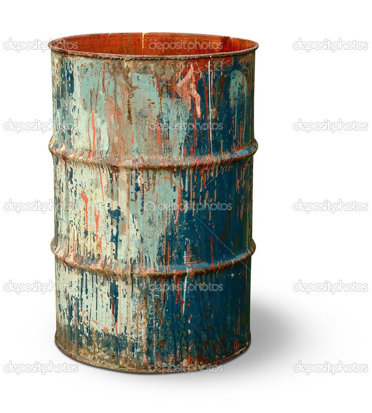 an old rusted metal barrel with paint splattered on the side and bottom