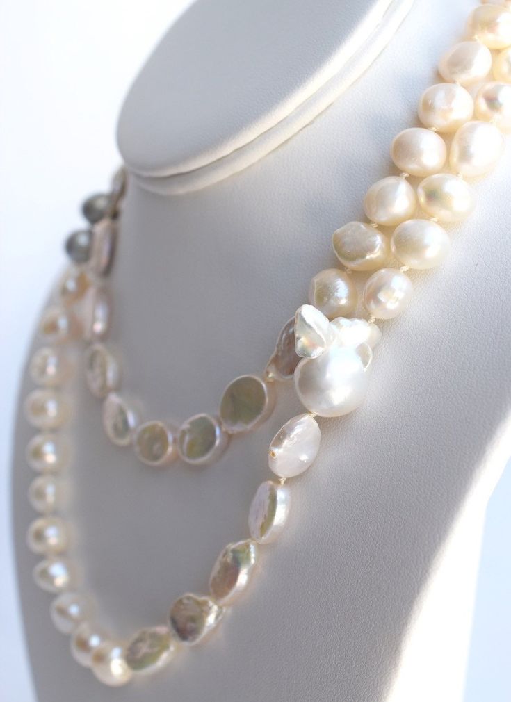 Materials- 9-10 mm near-round freshwater pearls, 11-14 mm oval coin freshwater pearls, (1) XL rare nucleated baroque pearl, 14k gold-filled bead clasp SizeLength: 37", can be worn long or doubled Each piece is limited edition and meticulously handcrafted by me in my Florida home studio. Please allow 3-5 days for production. Cheap Statement Pearl Necklace With Round Beads, Luxury Pearl Necklace With Lobster Clasp And Round Beads, Luxury Pearl Necklace With Round Beads, Luxury Classic Pearl Necklace With Round Beads, Luxury Round Beads Pearl Necklace For Festivals, Luxury Pearl Drop Beaded Necklaces With Round Beads, Luxury Pearl Necklace With Colorful Round Beads, Luxury Pearl Necklace With 8mm Round Beads, Luxury Pearl Jewelry With Round Beads