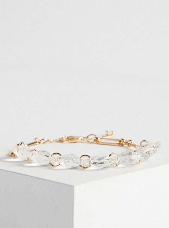 FIT Bangle silhouette. . MATERIALS + CARE Metal and stone. . Imported. . DETAILS High shine finish. The best plus size women's delicate stone bracelet bracelets in gold. Torrid is your destination for cozy fall and winter clothes to keep you warm and comfortable. Torrid is your destination for plus size SALE > CLEARANCE merchandise. Gold Faceted Bracelets, Faceted Gold Crystal Bracelet, Modern Gold Faceted Bracelets, Fitted Wedding Dress, Winter Clothes, Bra Cups, Cozy Fall, Stone Bracelet, Fall And Winter