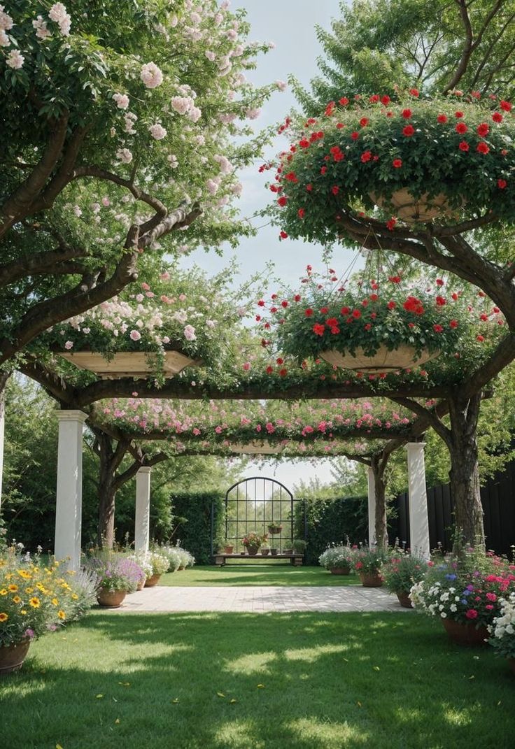 an outdoor garden with lots of flowers on the pergolated arbor and potted trees