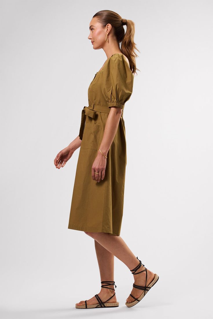 In crisp organic cotton poplin with a hint of Parisian charm, this effortless silhouette will have you perfectly dress(ed) for any occasion.Square neck, button-front dress with elastic at shoulders, puff sleeves, and front patch pocketsPrincess seams at front and mocked panel at back for fit Self-belt loops and detachable self-beltStyle has a slim fit, and can size up if desired100% Organic Cotton43" in LengthEthically Made in India Pocket Princess, Belt Style, Button Front Dress, Princess Seams, Princess Seam, Cotton Poplin, Puff Sleeves, Square Neck, Puff Sleeve