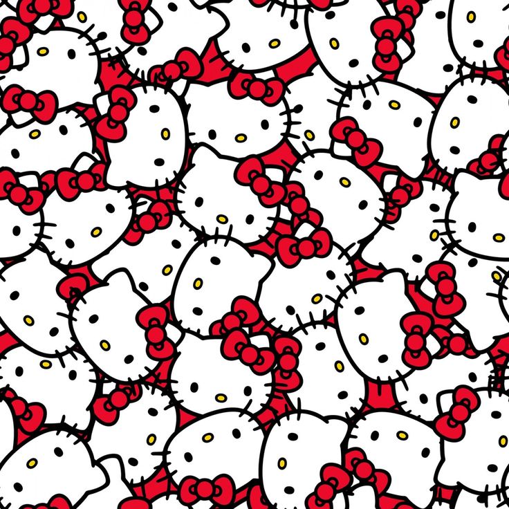 a bunch of hello kitty heads with red bows on them are all over the place