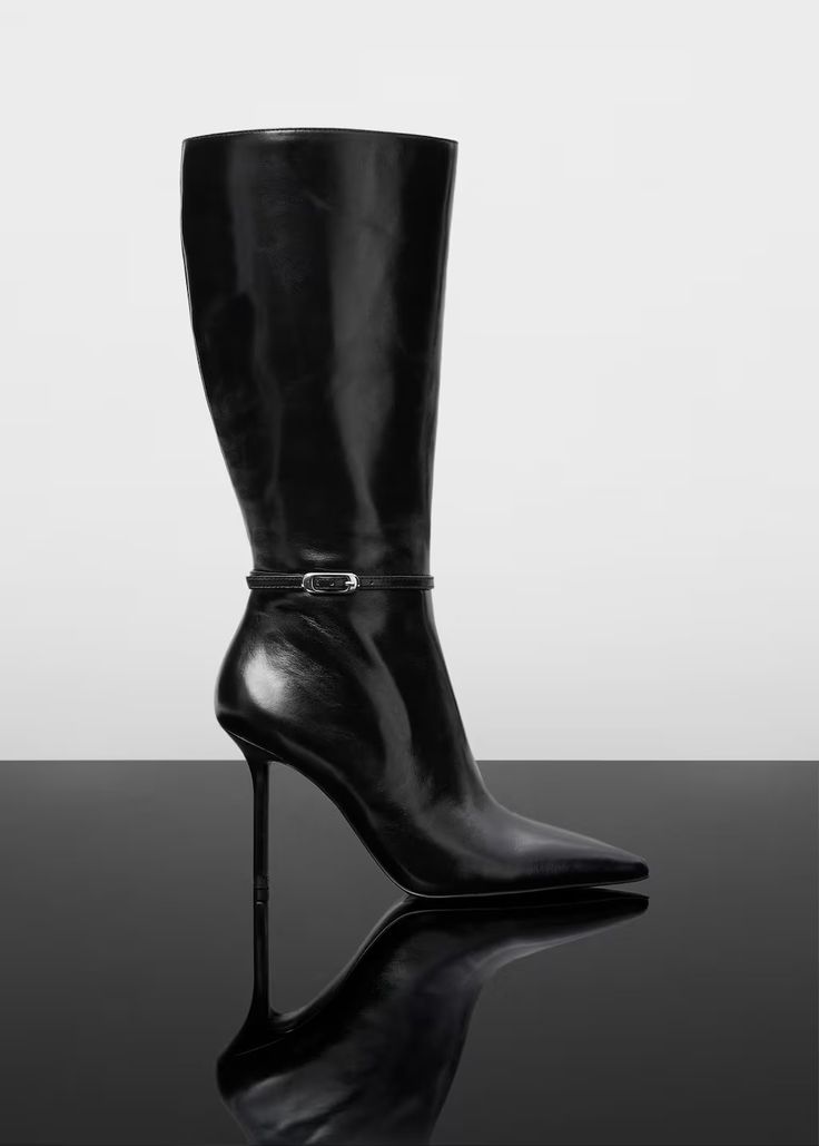 Heel leather boot - Women | Mango USA Elegant Fitted Knee-high Boots With Buckle Closure, Modern Knee-high Boots With Sculpted Heel For Party, Modern Knee-high Party Boots With Sculpted Heel, Formal Heeled Boots With Buckle, Modern Party Knee-high Boots With Sculpted Heel, Elegant Ankle Strap Boots For Parties, Elegant Leather Ankle Strap Heeled Boots, Modern High Heel Knee-high Boots For Party, Elegant Leather Knee-high Boots For Night Out