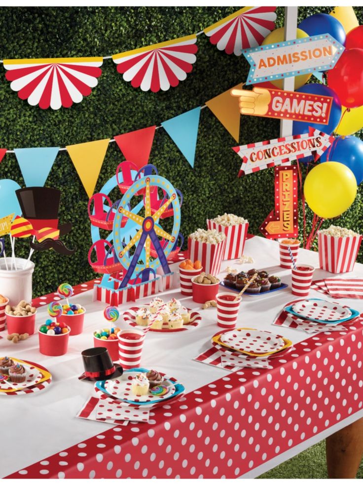 a carnival themed birthday party with red, white and blue desserts on a table