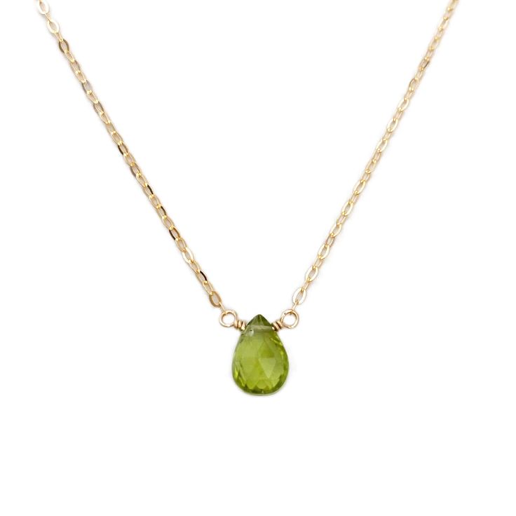 The dainty peridot necklace is perfect for anyone with an August birthday. Peridot has been prized throughout history for its protective powers and the ability to help one recognize their own destiny and purpose. These gemstones are an olive-green color, and crafted with care onto your choice of 14k gold, gold fill or sterling silver chain.DETAILS- Genuine Peridot- Peridot size: approximately 9 mm by 6 mm- Made in gold filled, sterling silver or 14k solid gold- Adjustable chain 14" - 16", 16" - Peridot Faceted Jewelry For May Birthstone, Faceted Peridot Jewelry For May Birthstone, Peridot Gemstone Pendant Necklace, Teardrop Peridot Jewelry For May Birthstone, Teardrop Peridot Birthstone Jewelry, Green Peridot Necklace For May Birthstone, Green Peridot Pendant Necklace, Dainty Green Peridot Jewelry, Peridot Gemstone Beads Necklace As Gift