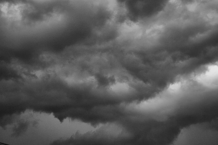 black and white photograph of storm clouds in the sky