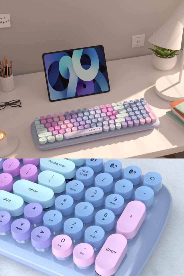 a computer keyboard sitting on top of a desk next to a mouse pad and monitor