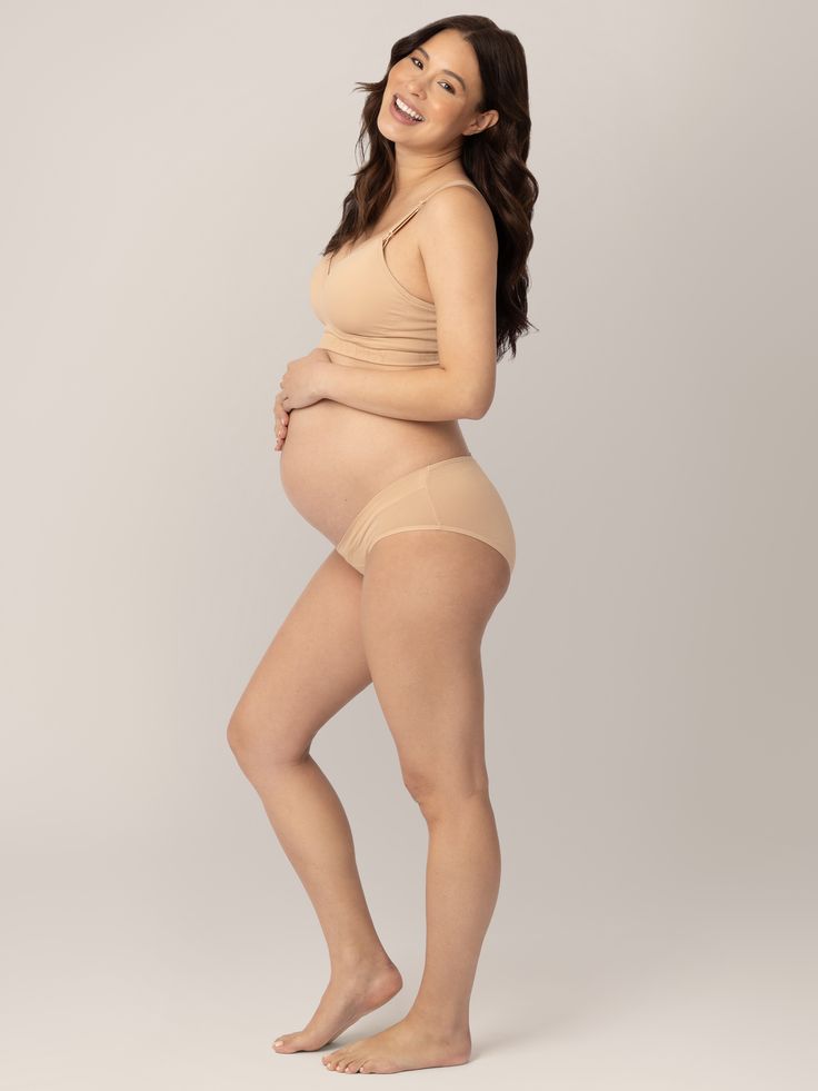 The perfect alternative to granny-panty maternity underwear! The Under-the-Bump Bikini Underwear for maternity and postpartum features stretchy fabric that sits just below your baby bump and naturally conforms to your changing body. Women at all stages of pregnancy love the clever notched design of these maternity panties, which offer full rear coverage with a no-roll waistband.  A five-pack of our fan-fave undies Low-rise panties for pregnancy and postpartum Low cut also works for C-section recovery Super-soft, stretchy fabric that moves with you   Note: For hygiene reasons, we cannot accept any underwear for return or exchange. If you’re unsure of sizing, please get in touch with our Customer Care Team. Delivery Gown, French Baby, Bamboo Pajamas, Pregnancy Wardrobe, Pajama Dress, C Section, Pregnancy Stages, Maternity Pants, Baby Bump