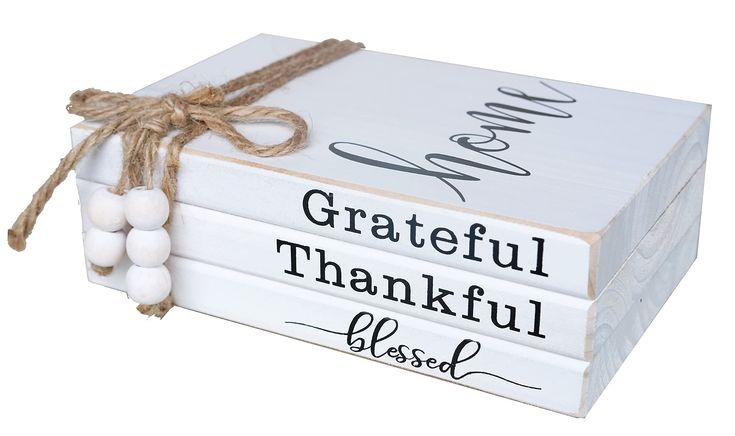 a stack of three books with the words grateful, thank and god written on them