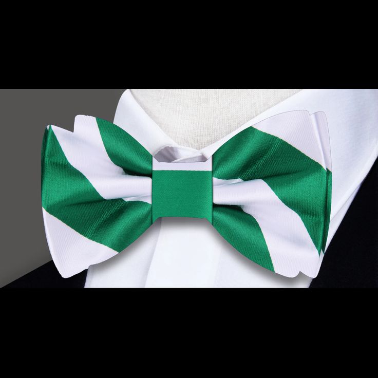 Radiant Elegance: Green and White Block Stripe Silk Bow Tie In the realm of sartorial refinement, the bow tie stands as an emblem of sophistication and flair. Our Green and White Block Stripe Silk Bow Tie invites you to embrace a fresh and vibrant aesthetic, effortlessly blending modernity with timeless elegance. Dive into the details of this exquisite accessory, exploring its design, customization options, and ideal pairings with dress shirts and suits, as well as the events where it shines the Classic Green Bow Tie For Formal Occasions, White Dapper Bow Tie For Formal Occasions, Classic White Bow For Formal Occasions, White Formal Bow For Summer, Elegant Green Tie With Satin Bow, Classic Green Bow Tie For Party, White Bow Tie For Formal Summer Events, Classic White Bow Ties, White Summer Bow Tie For Formal Occasions