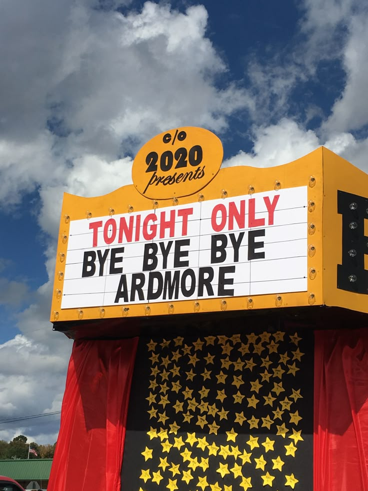 a sign that says tonight only bye bye bye and some stars on the side of it