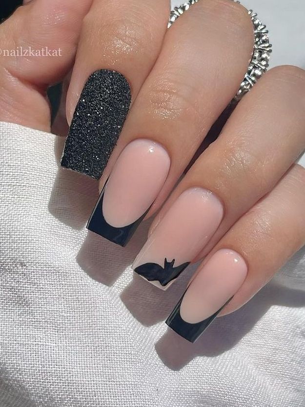 Halloween acrylic nails: simple black French tips with a bat Subtle Halloween Nails Coffin, Batman Inspired Nails, Batman Acrylic Nails, Batman Nails Design, Batman Nails Acrylic, Nails Inspiration Halloween, Fall And Halloween Nails, Batman Nail Art, Spooky Manicure