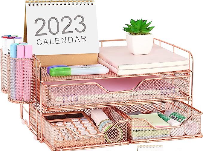 the desk organizer is organized and ready to be used as a calendar, pencils, markers, pens, and other office supplies