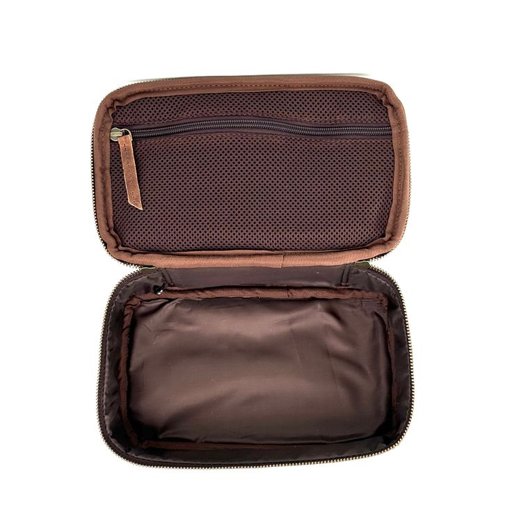 The 6666 leather travel case is crafted from full grain leather and features the 6666 brand stamped on the top. Genuine full grain leather Stamped 6666 brand Leather handle Zip around top closure 1 spacious main compartment 1 interior mesh zip closure pocket 10” W x 6” L x 3.5” D Imported Luxury Travel Cases With Zipper Closure, Leather Rectangular Pouch For Daily Use, Luxury Case With Zipper Closure For Everyday Use, Luxury Cases With Zipper Closure For Everyday Use, Classic Leather Pouch With Interior Card Slots, Classic Leather Pouch With Card Slots, Leather Business Pouch In Rectangular Case Shape, Leather Business Pouch In Rectangular Shape, Business Leather Pouch In Rectangular Shape