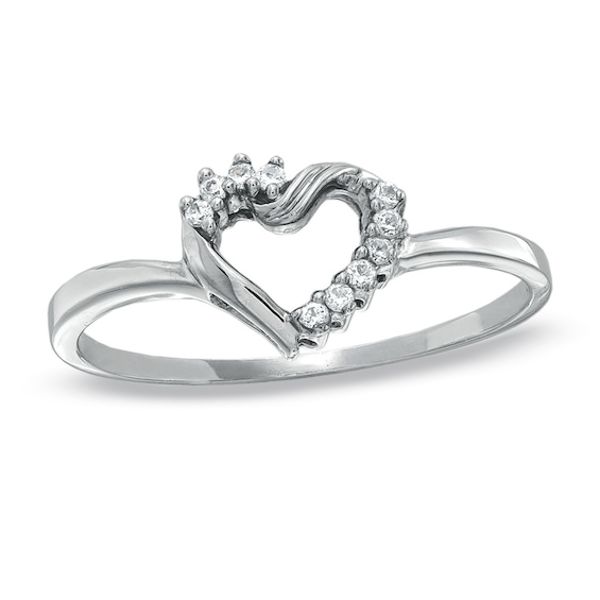 a white gold heart shaped ring with diamonds