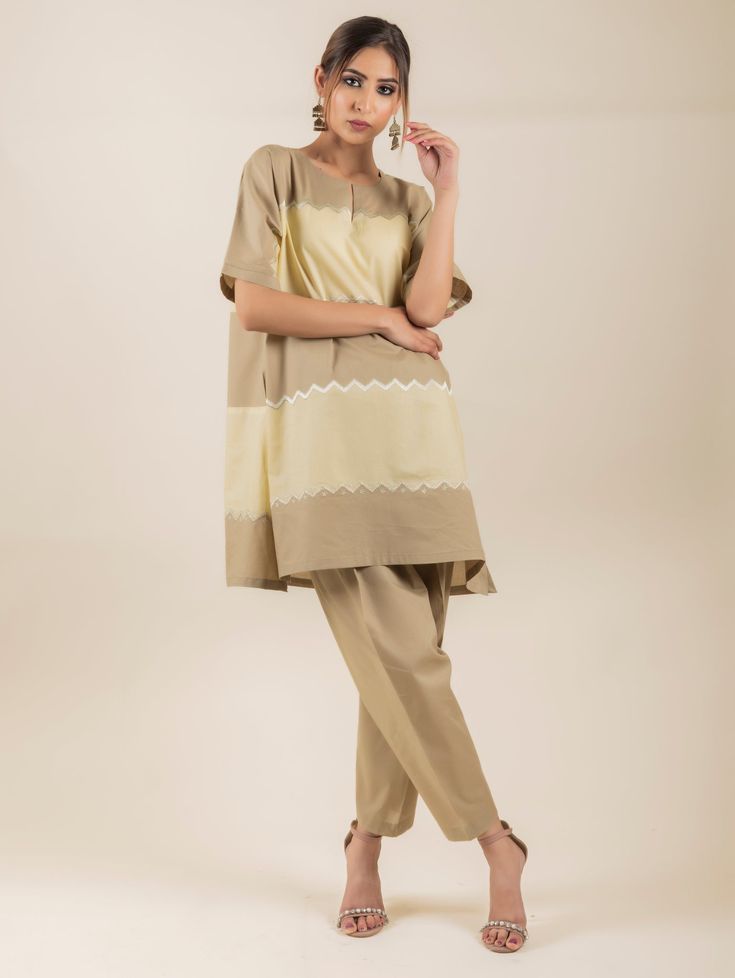 PRODUCT DETAIL: This kurta set comes laden with beautiful embroidery detail. The subtle hues and breezy comfort fit, make it a perfect outfit to adorn this summer. *The length of the top can be altered according to client preference. Reach out to get yours customized SPECIFICATIONS: Color LEMON & BEIGE Fabric Cotton Product Code RANG24 Beige Suit, Peach Tie, Yellow Suit, Beige Suits, Purple Tie, Dark Beige, Beige Fabric, Co Ord Set, Kurta Set