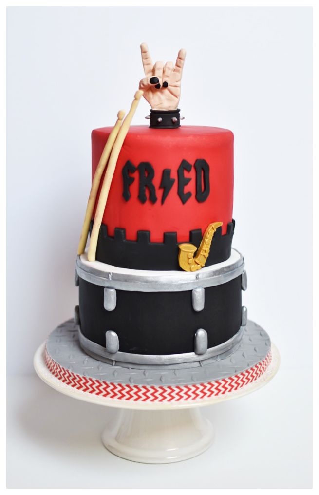 a red and black cake with the word fried on it