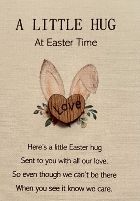 a little hug at easter time sign with two bunny ears and the words,'here's a little easter hugs sent to you with all our love so even though we can't be there when