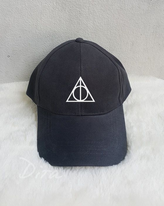 A Deathly Hallows baseball cap will be the perfect addition to your OOTD. | 25 Harry Potter Accessories That Are Actually Stylish Harry Potter Accessories, Harry Potter Merch, College Ideas, Harry Potter Jewelry, Harry Potter Style, Harry Potter Shirts, Jewelry Organizers, Harry Potter Outfits, Deathly Hallows