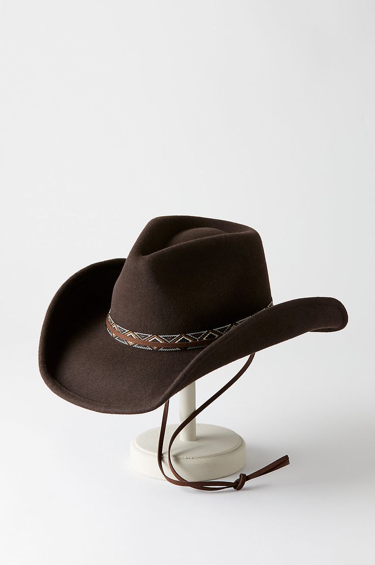 Saddle up and get ready to ride off into the sunset in the Big Sky hat, made from soft, breathable wool felt. With its western styling—including a chin cord and woven hatband—this shapeable hat is the perfect accessory to your well-loved jeans, cowboy boots, and dependable steed. With an adjustable sweatband for a personalized fit. Luxury Western Beige Felt Hat, Modern Cowboy Hat, Woman In Cowboy Hat, Adjustable Felt Hat For Winter Country Events, Southwestern Wide Brim Felt Hat For Western-themed Events, Adjustable Western Felt Hat For Country Events, Western Style Felt Hat For Winter, Western Felt Hat For Rodeo In Winter, Western Style Felt Hat For Rodeo In Winter