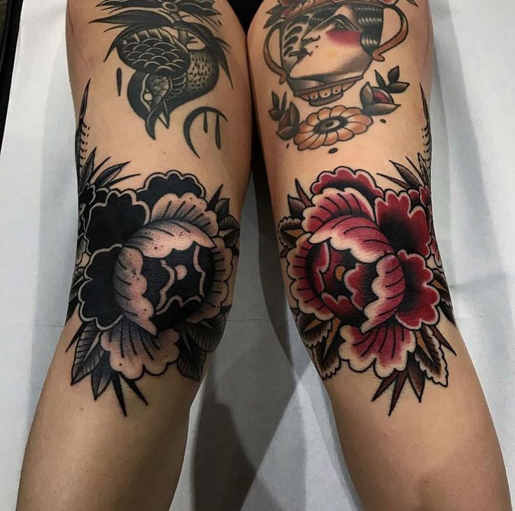 the legs are decorated with tattoos and flowers