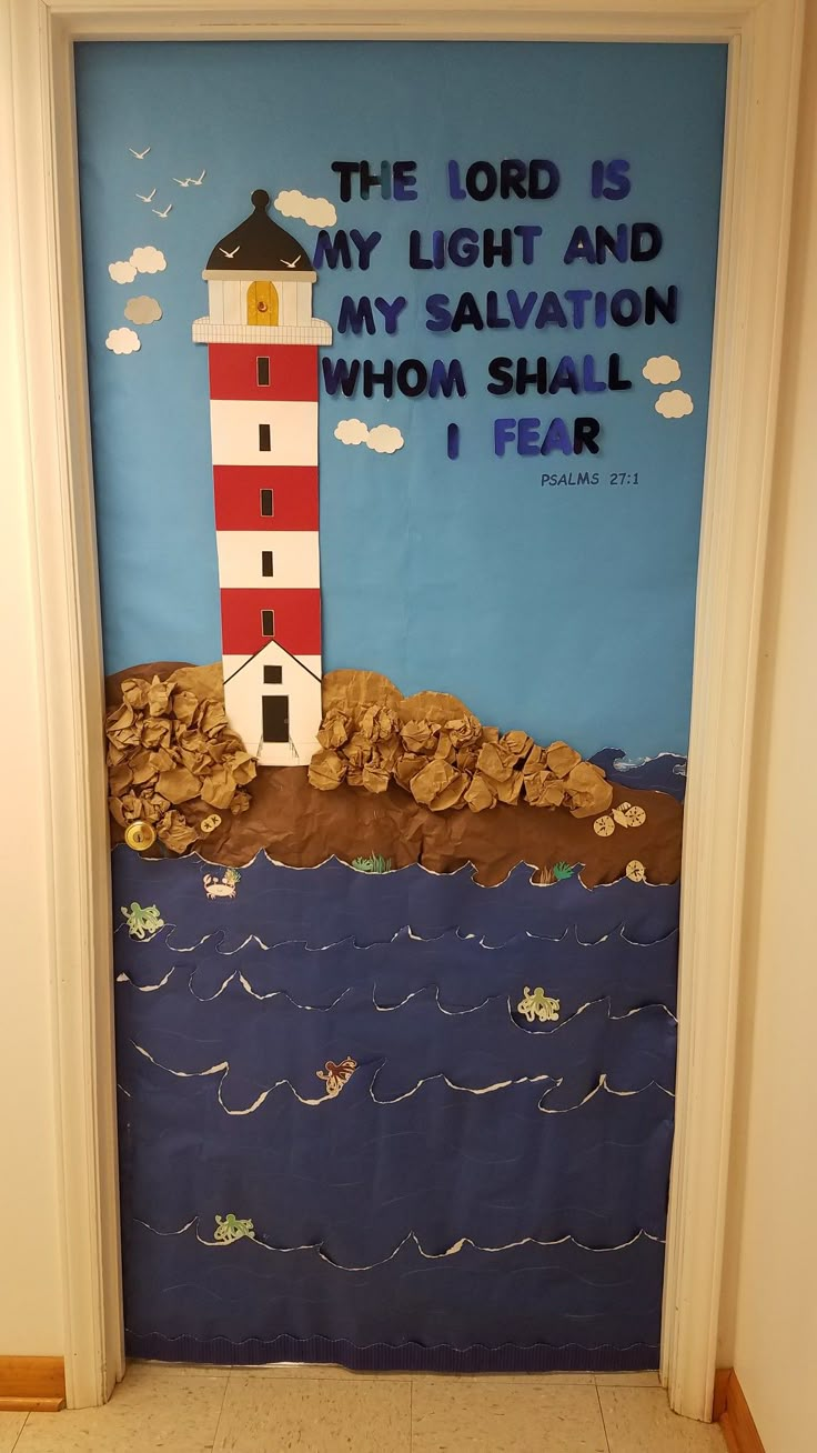 a door decorated with a lighthouse and the words, the lord is my light and my salvation whom shall i fear