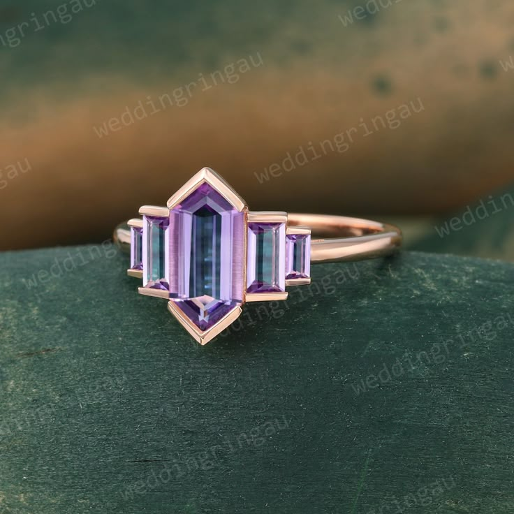 Art Deco Octagon Wedding Rings, Rectangular Faceted Jewelry For Weddings, Octagon Bezel Set Jewelry For Wedding, Octagon Bezel Setting Wedding Jewelry, Elegant Faceted Amethyst Wedding Ring, Elegant Faceted Amethyst Ring For Wedding, Art Deco Octagon Rings As Gifts, Wedding Amethyst Ring With Bezel Setting, Purple Art Deco Jewelry For Wedding