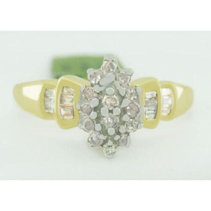 Number Of Diamonds: 25 Main Stone Creation: Natural Cut Grade: Very Good Main Stone Color: White Metal: Yellow Gold Total Carat Weight: 0.75 Carats Main Stone: Diamond Ring Size: 7.75 (Free Resizing Service - If Needed) Setting Style: Prong Metal Purity: 14k Main Stone Shape: Round & Baguette Base Metal: Gold White Cluster Ring Stamped 14k, Marquise White Diamond Ring With Vs Clarity, White Marquise Diamond Ring With Vs Clarity, Dazzling Marquise Cut White Diamond Ring, White Marquise Diamond Ring, White Marquise Cut Diamond Ring Fine Jewelry, White Cluster Ring With Baguette Cut For Wedding, Formal White Marquise Cluster Ring, White Diamond Ring With Baguette Cut