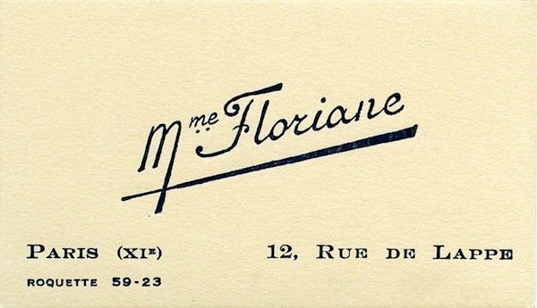 a close up of a business card with the words paris kjp on it