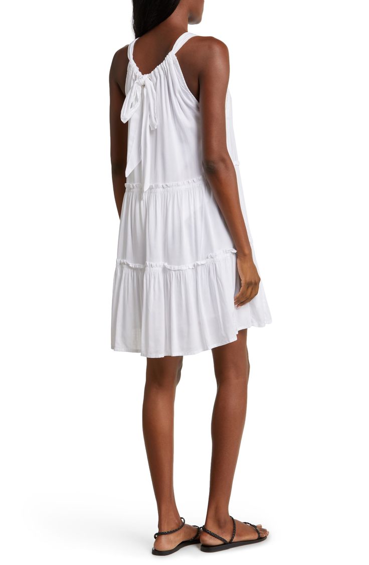 Take a stroll by the water in this breezy cover-up dress topped by adjustable ties for a perfect fit every time. 31 1/2" center front length (size Medium) Ties at neck Scoop neck Adjustable tie straps Unlined 100% rayon Hand wash, line dry Imported Breezy Vacation Dresses With Tie Straps, Spring Vacation Beach Dress With Drawstring, Casual Beach Dress With Drawstring For Cover-up, Casual Tiered Sundress For Beach, Tiered Sundress For Beach In Summer, Tiered Sundress For Summer Beach, Tiered Beachwear Dress For Vacation, Bohemian Spring Beach Dress With Drawstring, Tiered Summer Sundress For Beach