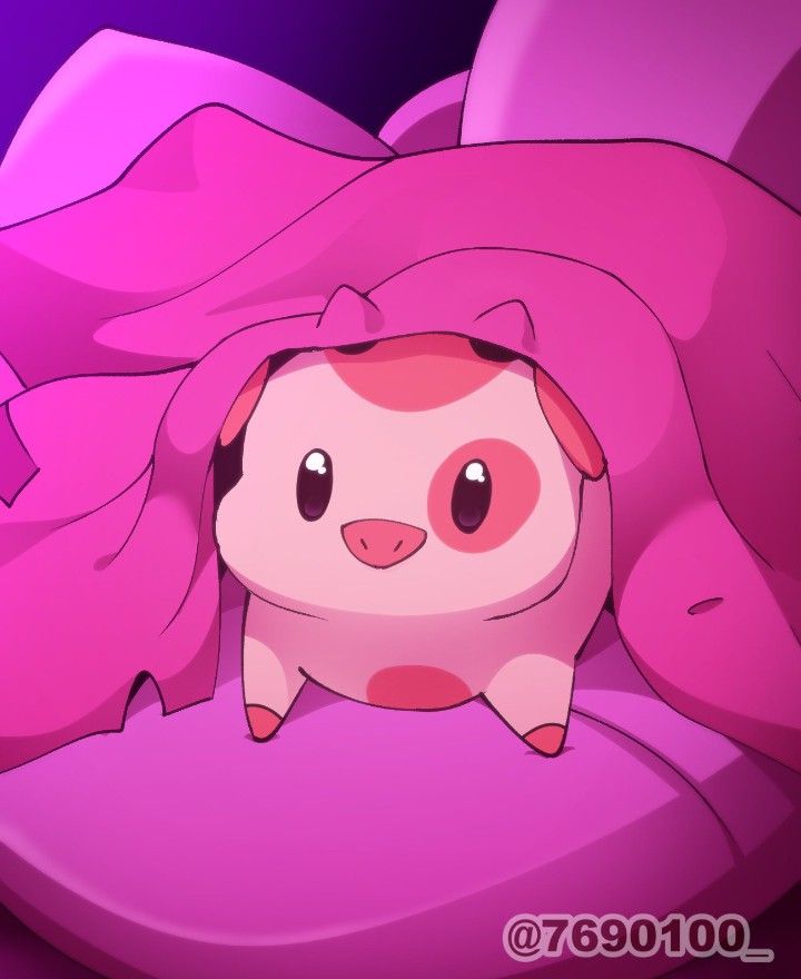 a pink and white animal under a blanket