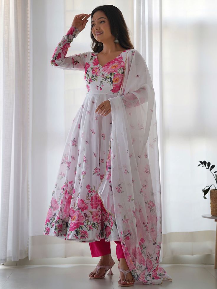 Introducing our astonishing white floral printed organza event wear anarkali suit, a stunning outfit that will make you stand out at any festival, function, or event. This beautiful white color anarkali suit is fully stitched and available in sizes ranging from XS to XXL, ensuring a perfect fit for all body types. The suit features intricate floral print work on the organza fabric, adding a touch of elegance and charm to your look.
This outfit include the white color organza anarkali suit with f Kali Pattern, Cutwork Saree, Simple Lehenga, Printed Organza, Gown With Dupatta, Traditional Attires, Party Wear Lehenga Choli, Reception Gown, Designer Gown