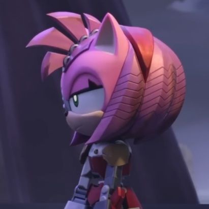 an animated character with pink hair and spiked ears