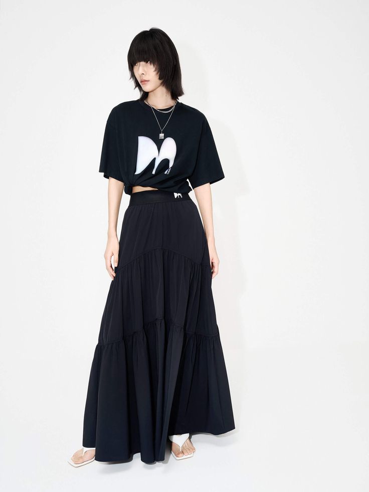 MO&Co. Women's Flowy Maxi Skirt Features : - Double side pocket design, flowy fit, lined- Elasticized waistband and gathered seam details- Cool touch fabric Code: MBD2SKTT12The back length of size S is 95.5cmMATERIALS & CARE Material: 78.2% Polyamide 21.8% SpandexOur sizes might be a little different from US/EU sizes. Please refer to the size guide carefully before purchasing at the above description.REMINDER: All items are measured manually. Please note that it's reasonable that there might be Black Flowy Skirt With Elastic Waistband, Casual Lined Voluminous Maxi Skirt, Casual Voluminous Maxi Skirt With Pockets, Casual Bottoms With Voluminous Solid Skirt, Summer Black Lined Cargo Skirt, Relaxed Fit Tiered Maxi Skirt With Lining, Casual Voluminous Lined Maxi Skirt, Black Pleated Skirt With Relaxed Fit, Black Relaxed Fit Maxi Skirt For Spring