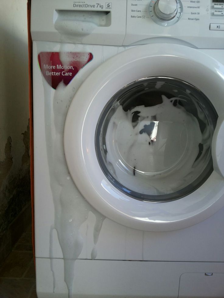 a dirty washing machine with water in it