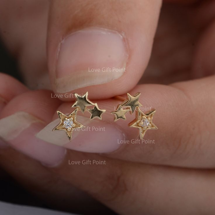 Description Triple Sparkling Star Minimalist Stud Earrings Solid 14K Yellow Gold Handmade Fine Princess & Fair tale Jewelry Gift For Her ≫ Features * Items Code: ST00278 * Solid 14K Yellow Gold with stamped * 18K also available - Additional fees may apply) * More option in gold color: Rose , yellow , White gold * Diamonds Wt : 0.03 Ct * Diamond color : G-H * Diamonds Clarity : SI * Diamonds cut : Brilliant * Size :- 10 mm ≫ FAQ below for more detail. ✦ For International Buyer - Customs and i Fine Jewelry Star Earrings For Anniversary, Gold Star Earrings For Anniversary, Anniversary Jewelry With Matching Star Earrings, Celestial Star Earrings For Anniversary, Anniversary Jewelry With Star-shaped Matching Earrings, Pierced Star-shaped Jewelry For Anniversary, 14k Gold Star-shaped Jewelry For Anniversary, Anniversary Star-shaped Jewelry With Matching Earrings, 14k Gold Star Shaped Pierced Jewelry