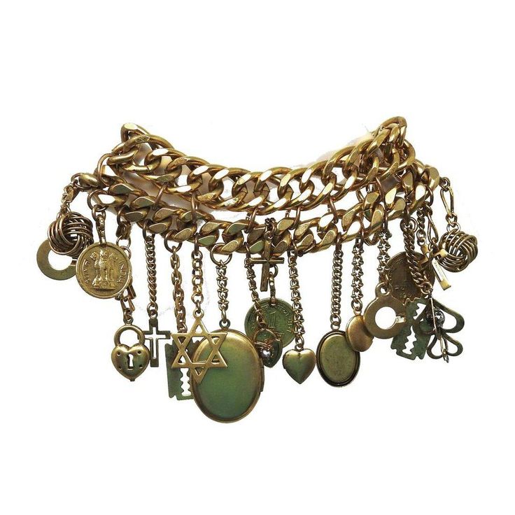 Spectacular charm bracelet with multiple charms in gold with crystal accents on double chunky chain bracelet Gold Vermiel Swarovski crystals Measures 7.5" Charms up to 2.5" long Gold Chain Bracelet With Dangle Charms, Gold Dangle Chain Bracelet With Charms, Brass Bracelet With Charms, Brass Charm Bracelet Jewelry, Gold-tone Metal Bracelets With Charms, Metal Chain Link Jewelry With Charms, Gold-tone Brass Jewelry With Dangling Charms, Metal Charms Jewelry For Accessorizing, Gold-tone Metal Charm Bracelet